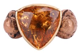 A citrine dress ring, set with a central citrine measuring 15.2 x 15mm, in a closed back setting, th