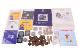 A mixed collection of coins including a commemorative Queen Elizabeth II 70th birthday £5 coin, Gibr