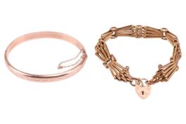 A yellow metal gate-link bracelet, fastened with a 9ct yellow gold heart-shaped clasp, together with