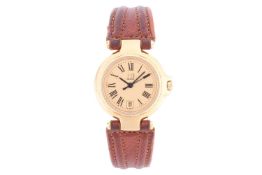 A Dunhill P12 lady's wristwatch in a gilt case measuring 26mm, featuring a Swiss-made quartz movemen