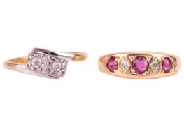 Two gem-set rings; comprising a ruby and diamond gypsy set ring in a yellow metal mount stamped '18c