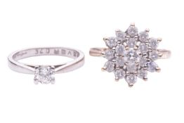 A diamond solitaire ring, the round brilliant diamond measuring approximately 4mm, with an estimated