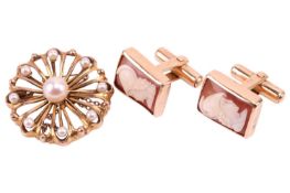 A pair of shell cameo portrait cufflinks, each with a classical Roman profile, in a yellow metal mou
