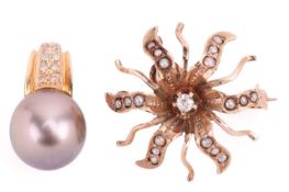 A gem set floral brooch-cum-pendant, featuring an old cut diamond set to the centre, with the surrou