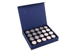 An American 1oz silver dollar set, containing 36 individually capsulated 1oz dollar, cased in box.