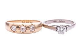 A three-stone old-cut diamond set Gypsy ring in 18ct yellow gold and a solitaire diamond (4.6mm) set