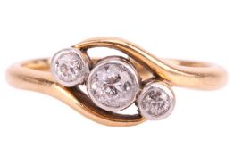 A three-stone diamond crossover ring, featuring three old-cut diamonds, the central diamond measurin