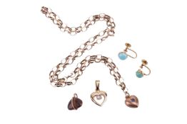 A Victorian heart pendant set with a blue sapphire, hallmarked 9ct gold, Chester, 1897, on a yellow 