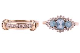 Two gem-set half hoop rings in 9ct yellow gold; including a three-stone sky blue topaz and diamond c