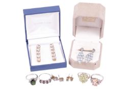 A pair of cubic zirconia five-stone pendant earrings, set in 9 carat gold, two further pairs of gem 