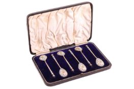 A set of six early 20th-century Russian silver gilt and enamel spoons cased, each bowl back polychro