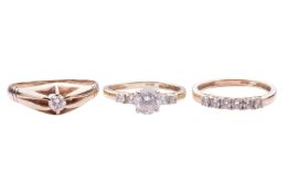 A diamond-set belcher ring, the central round brilliant diamond measuring approximately 4.1mm, with 