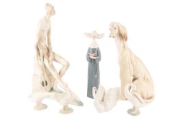 Collection of Lladro figurines to include a retired harlequin, a prayerful nun, an afghan hound, a s