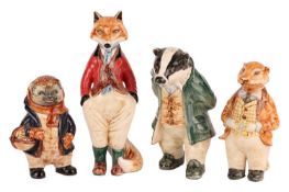 A collection of Cinque Ports pottery figures comprising of 'Freddy the Fox, 'Lord William Badger', a