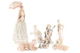 Collection of Lladro figurines to include the Lady with umbrella, a horse lying down, unlikely frien