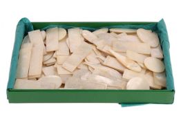 A large collection of mother of pearl gaming counters, some formed as fish.