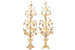 A pair of large floor-standing gilt metal Ecclesiastical candelabras, the bases possibly 19th
