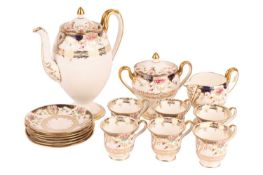 A Wedgwood floral patterned coffee set on white ground with blue and gold decoration, comprising of 
