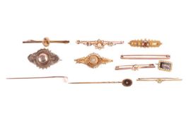 A collection of bar brooches and stick pins; including a Victorian Etruscan Revival diamond-set broo