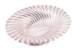 A silver bon bon dish by Asprey & Garrard, Sheffield 2001, of a flared oval form decorated with 