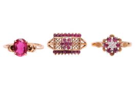 A group lot of three rings; to include a diamond and ruby floral ring with central diamond approxima