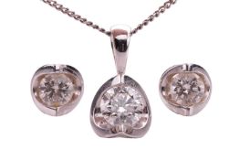 A diamond solitaire pendant with matching earrings, featuring a round brilliant diamond measuring ap