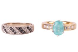 Two gem-set dress rings in 18ct gold; the first centred with an oval-cut Paraiba-type tourmaline, ap