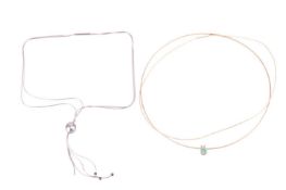 A Tahitian cultured pearl tassel necklace and two other wire necklaces; one including an octagonal s