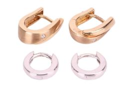 A pair of huggy earrings in 9ct white gold, and a pair of diamond-set hoop earrings in 18ct yellow g