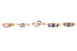 A collection of gem-set rings comprising a Victorian sapphire and diamond half-hoop ring, hallmarked