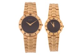 A set of matching Gucci watches Ref:3300 His and Hers. Featuring a Gucci 3300.2M with a quartz movem