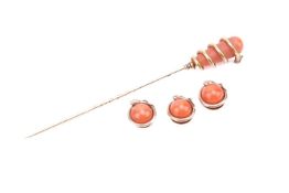 A coiling serpent and coral stick pin, measuring approximately 10cm long, together with three matchi