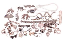A quantity of white metal jewellery. To include a large number of marcasite set brooches of various 