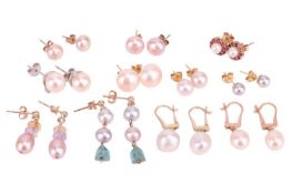 Eleven pairs of cultured pearl earrings; including examples of a pair of pearl and diamond accented 
