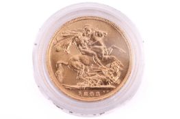 An 1893 Victoria Full-Sovereign with a plastic case, circulated.