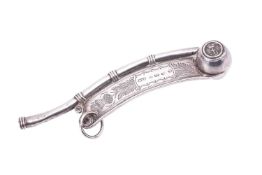 A Victorian silver bosun's whistle, with foliate style engraving depicting a thistle, with makers ma