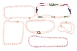 A collection of six cultured pearl necklaces including a single-strand pearl necklace, the pearls of