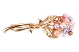 A cultured pearl brooch in case. The brooch is designed as a bouquet of flowers. Set with various co