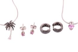 Two gem-set pendants with similar style earrings including a diamond-set palm tree pendant, in a whi