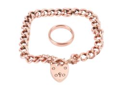 A gate bracelet with heart padlock, and a 9ct rose gold band ring. The curb link bracelet is un-hall