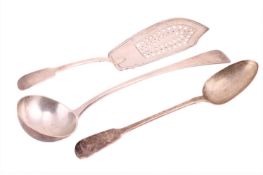 A silver ladle, a serving spoon and a fish slice; the ladle by Mappin & Webb London 1916, 36.0 c