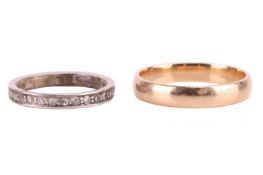 A full hoop diamond eternity ring in unmarked white metal mount; size L , 2.97 grams; together with 
