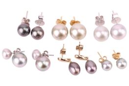 Six pairs of cultured pearl earrings including a pair of green-grey pearl earrings, measuring approx