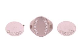 A gentleman's diamond-set signet ring and matching cufflinks, the ring star-set with ten round brill