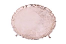 An Edwardian silver salver by Barker Brothers Ltd, retailed by Drew & Co., Chester 1907, of circ