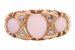 An opal three-stone half-hoop ring, the graduated oval opal cabochons interspersed with four mine-cu