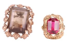A large smoky quartz dress ring, centred with a large octagonal step-cut smoky quartz of 19.8 x 15.2