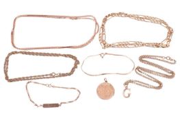 A small collection of chains and pendants; to include an Edwardian 15ct yellow gold round locket, Ch