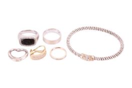 A group lot of jewellery to include a bi-metal rope twist bangle, a diamond set heart-shaped pendant