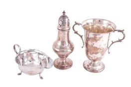 A Mappin & Webb two-handled cup and sauce boat together with a sugar caster by G Bryan & Co;